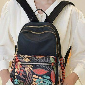 Black & Yellow Leaf Backpack by JellyYoo